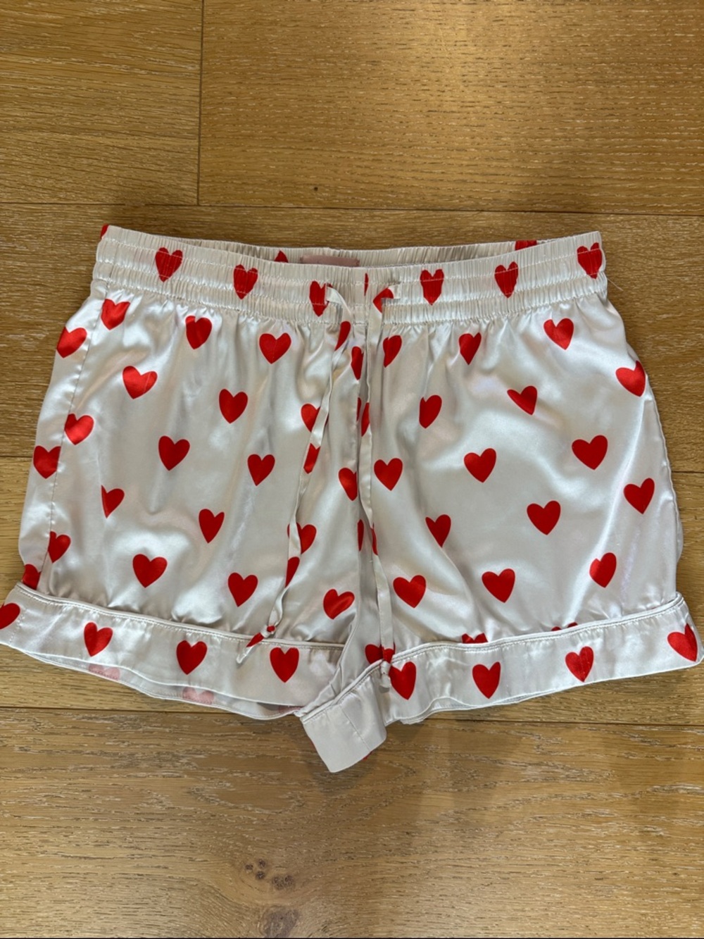 Show Me Your MuMu White Satin Shorts with Red Heart Print